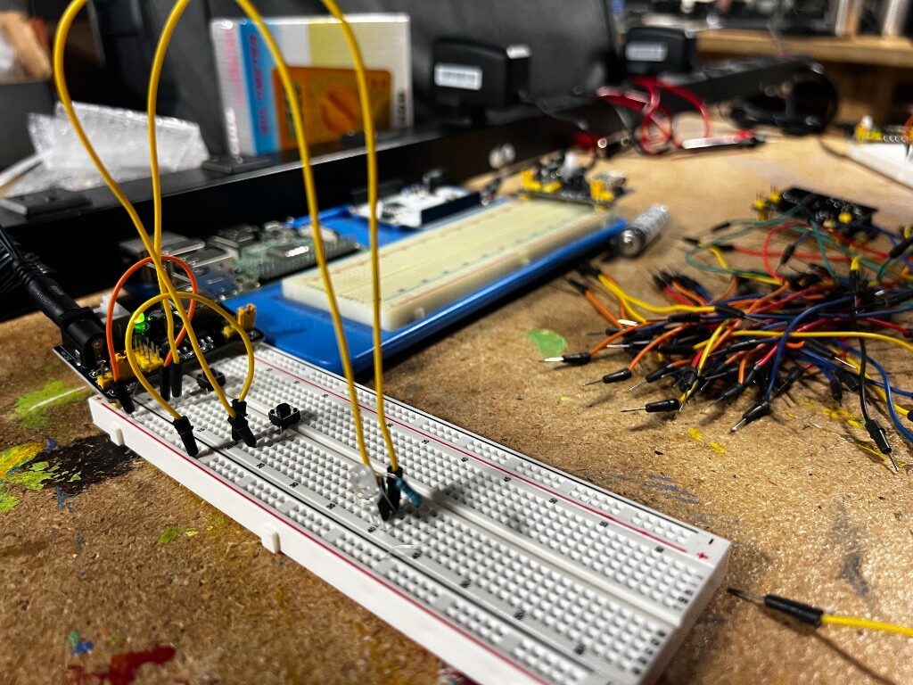 Electronics breadboard with jumper wires